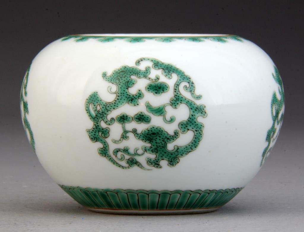 Chinese Green and White Porcelain Pot: Finely painted with four roundrels to depict opposing dragons, raised on short footring, base bearing seal mark in underglaze red, 3"H x 4.5"D.