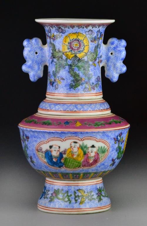 Chinese Famille Rose Sectional Vase: Consisting of four parts finely painted to depict lotus blossoms and scrolling tendrils against a blue ground, having ruyi handles, the base of each section with iron red seal stamp under glaze, 8.5"H