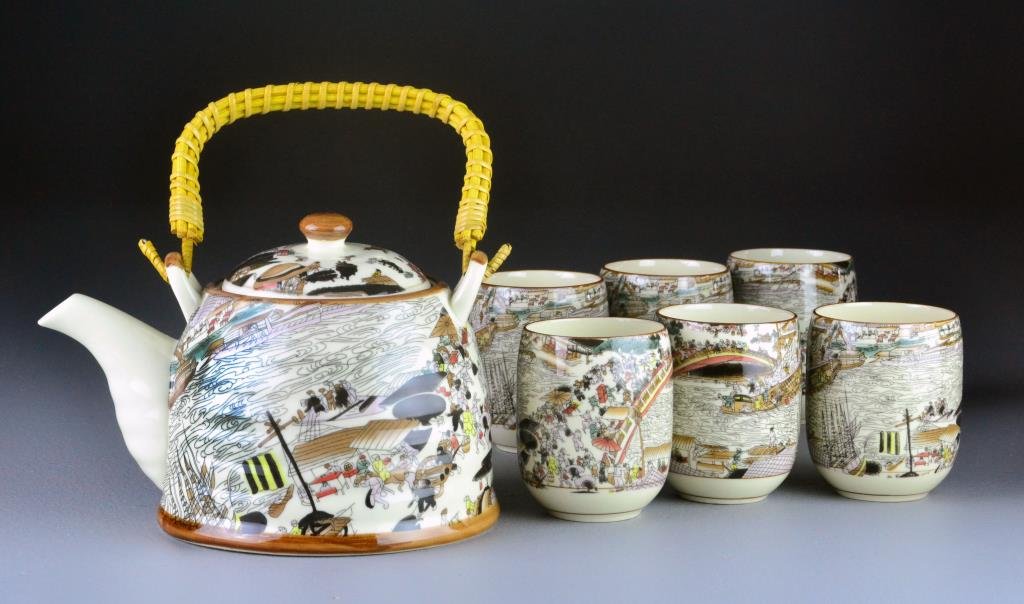 (7) Piece Chinese Contemporary Porcelain Tea Set: Depicting a crowded street scene, having a tea pot and six cups, bases having five character mark, tea pot measures 5"H X 7.5"L.