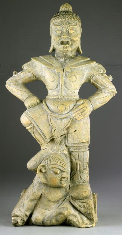 Japanese Carved Stone Ni-o Guardian Statue: Ornately carved featuring Ni-o figure Misshaku Kongo, open mouthed representing power, 18"H x 14.75"W.