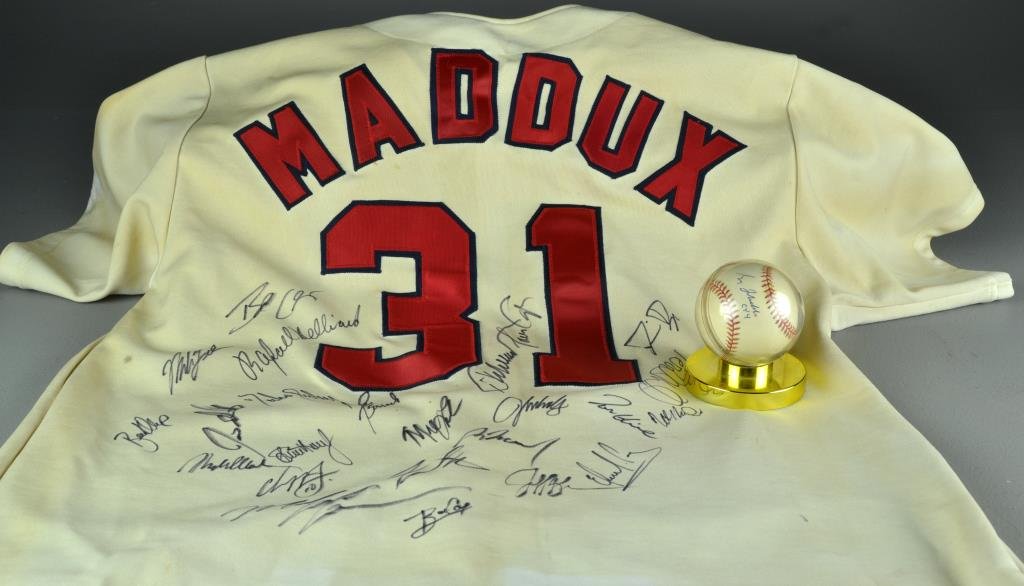 (2) Atlanta Braves Greg Maddux Signed Ball Team Jersey: To include a Greg Maddux jersey signed by the Atlanta Braves, but not Greg Maddux. A signed Greg Maddux ball signed " Greg Maddux CY4," to indicate having been a Cy Young winner 4 times.