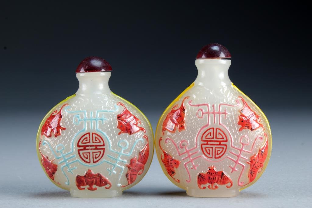 (2) Chinese Peking Glass Snuff Bottles: Each finely molded and painted to depict bats and Shou symbols, tallest is 3.1"H.