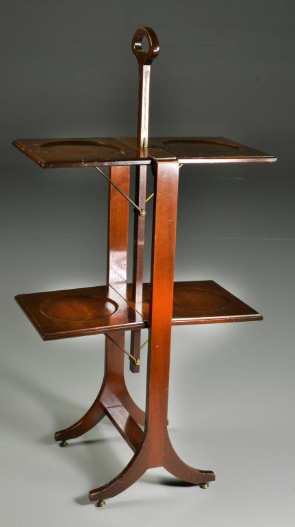 Antique Mahogany Folding Pie Stand: Having four square retractable plate trays, raised on splayed legs with brass feet, measures 32.5"H, circa early 20th century. Condition, one tray having several abrasions, light overall wear otherwis