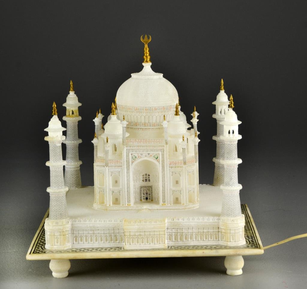 A Large Alabaster Model of the Taj Mahal: A realistically modeled alabaster Taj Mahal, having painted details and gilt metal finials and lighted for display fitted in its original wood box, measures 12" Sq. x 13" H not including the box, poss