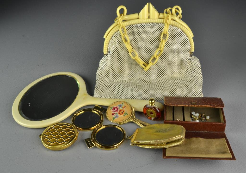 (8) Pcs Women's Vanity Articles: Comprised of an Ivory Pyralin celluloid hand mirror, miniature Jean Desprez French perfume, four compact mirrors including Judith Leiber and Irving Rice makes, an Italian leather change purse, set of