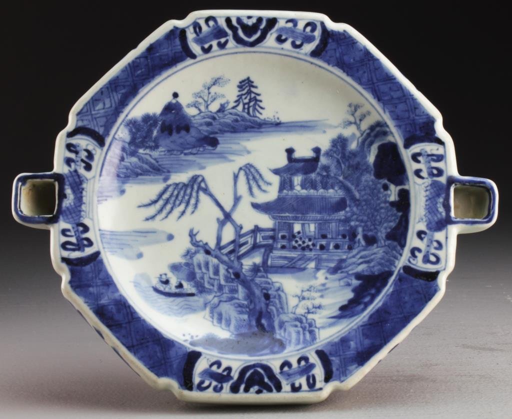 Chinese Qing Blue & White Food Warming Plate: Finely painted to depict pagoda within a landscape, having two openings for which to put hot water in to warm food, 2"H X 9.875"D, circa late 19th/early 20th century.