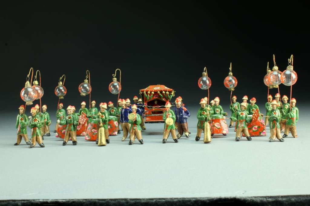 (35) Pcs Chinese Toy Processional Figurines: To include thirty five pottery figurines carrying a throne with noble figure, drums, lanterns and other processional items, largest measures 2.5"H, circa late 19th-early 20th century. Condition: some 