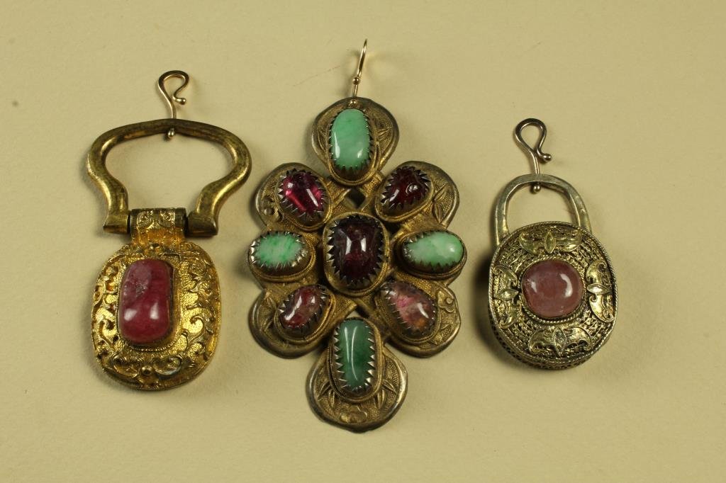 (3) Chinese Qing Gilt Bronze & Stone Mounted Pendants: Two probably old belt buckles, all having finely chased gilt bronze details, including bats, lotus blossoms and tendrils, each mounted with various stones, including jade, amethyst and others, largest