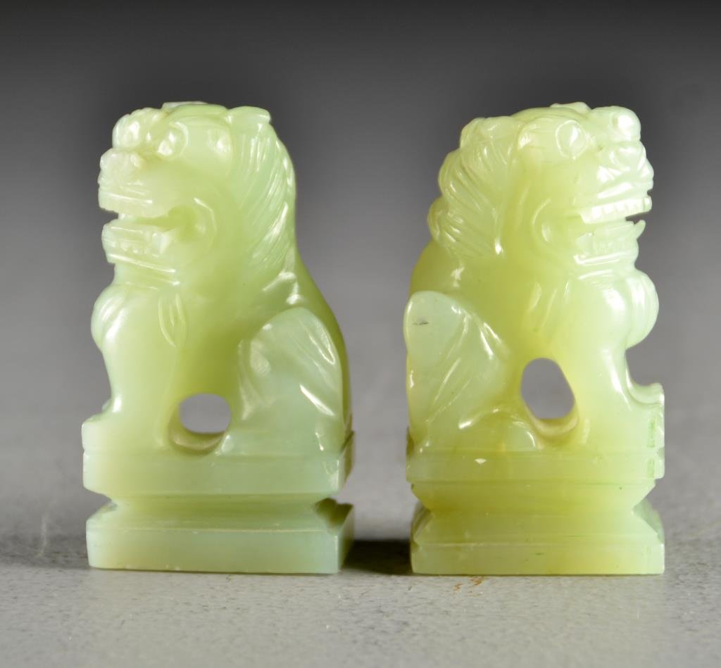 Pr. Chinese Carved Jade Foo Dogs: Carved to depict foo dogs atop a plinth, 3"H.