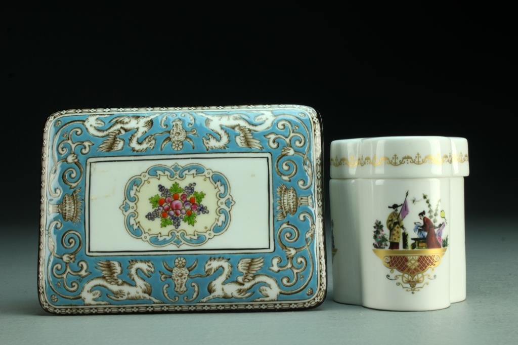 (2) Pcs English Wedgwood & Royal Worcester Porcelain: To include a cigarette box marked for Wedgwood in the light blue tendril and griffin pattern Florentine, 5"W, along with a clover-formed covered jar with Asian figures and gilt accents, marked for Roy