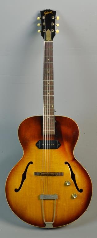 1956 Gibson ES-125T Electric Guitar: Double bound thin maple body, sunburst finish on top, dark natural finish on sides and back, 14 fret mahogany neck, rosewood fretboard, dot inlays, 20 frets, 1 smokin' P-90 pickup, adjustable wood bri