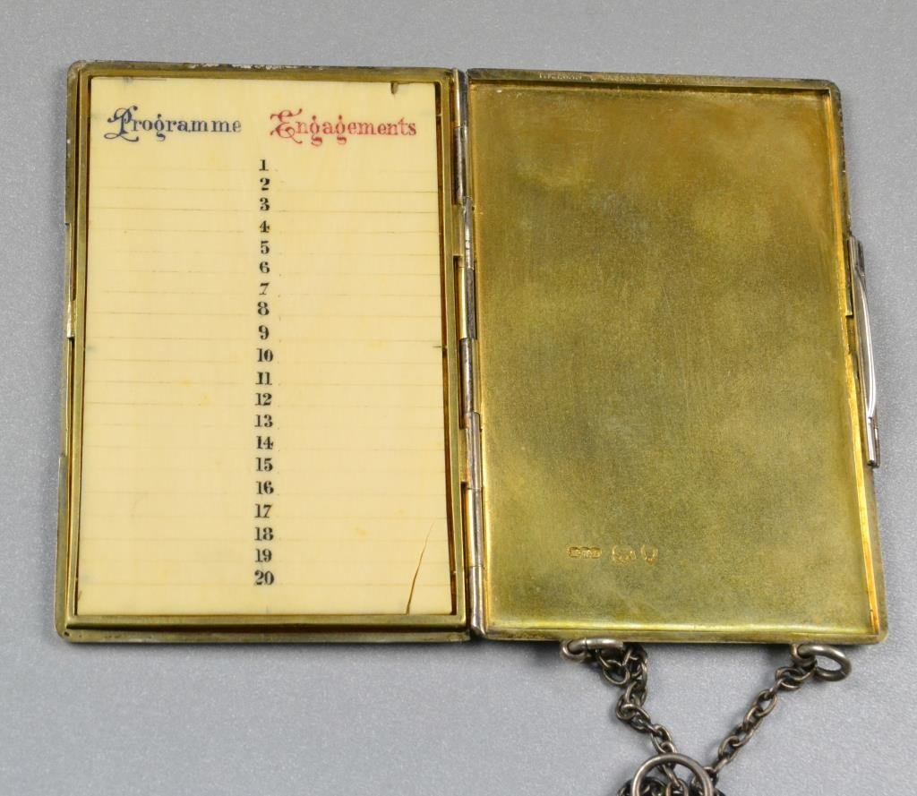 Beasley & Beasley London Sterling & Gilt Book: A sterling and gilt engagement book with gilt wash interior, having it's original paper engagement log and hung with silver chain, marked for Beasley & Beasley 34. St. James Street London, 4.4oz total
