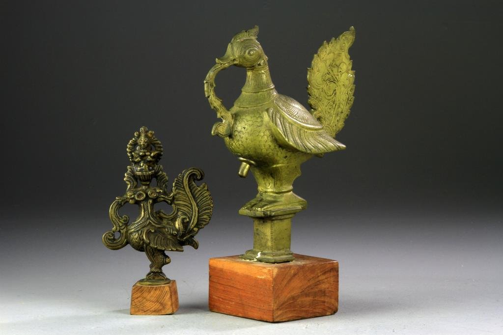 (2) Indian Bronze Wedding Grease Lamp Finials: To include two stylized three dimensional roosters each mounted on a wood base, circa late 19th-early 20th century. Collection of the Late Robert Willis owner of R.F. Willis Galleries, Grand Rapids, M