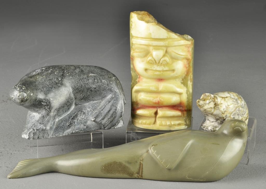 (4) Inuit & South American Stone Carvings: To include three seals in soapstone, probably Inuit, and a South American or Aztec alabaster figural carving, largest measures 8.5"L, circa 20th century.