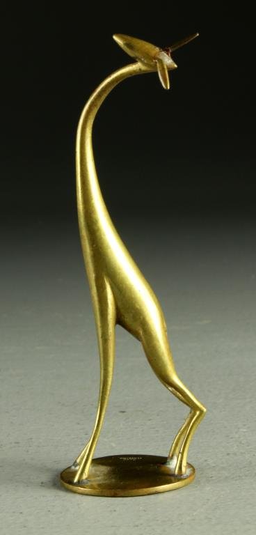 A Hagenauer(?) Brass Giraffe: In the Art Deco taste, the base stamped Made In Austria, measures 5"H. Condition: excellent, slight discoloration to right ear.