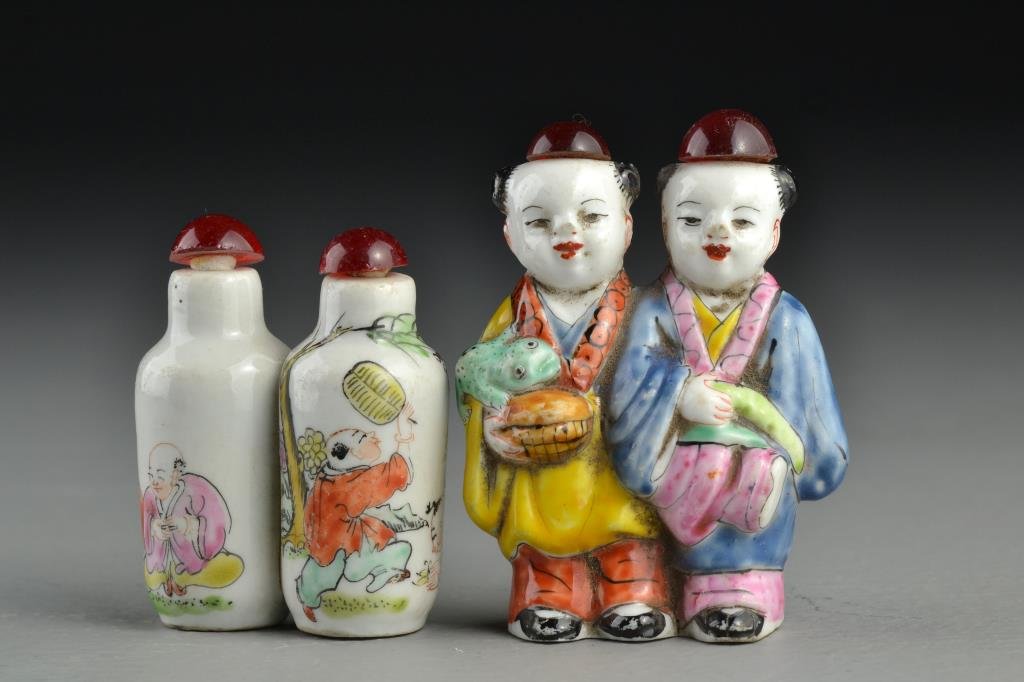 (2) Chinese Porcelain Double Snuff Bottles: To include two double snuff bottles, one formed as figures holding frog and coins, having painted details to face and clothing, the second example painted to depict playful youth in a landscape, talle