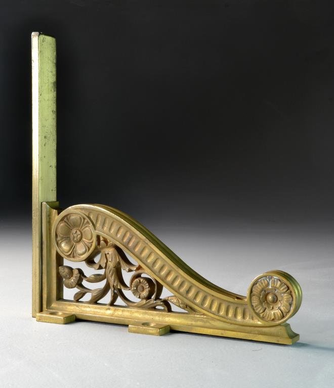 Antique Cast Bronze Inc. Wall Bracket: To include a wall mount bracket having pierced scroll and floral design, measures 9.5"H x 10"D, circa early 20th century.