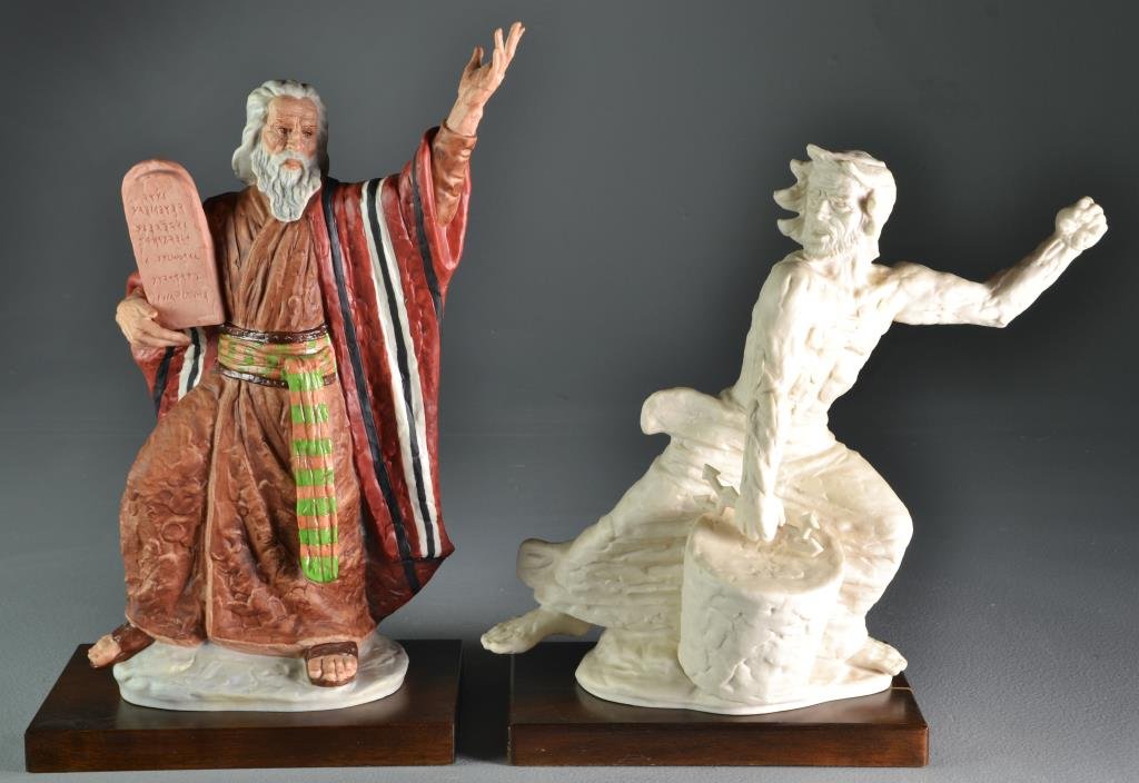 (2) Laszlo Ispanky Limited Edition Porcelain Figures: To include a polychrome decorated porcelain figure of Moses holding the Ten Commandments, stamped to base "Goebel Made in USA 1977 Laszlo Ispanky 15 of 500", together with a figure of Zeus stamped "Go