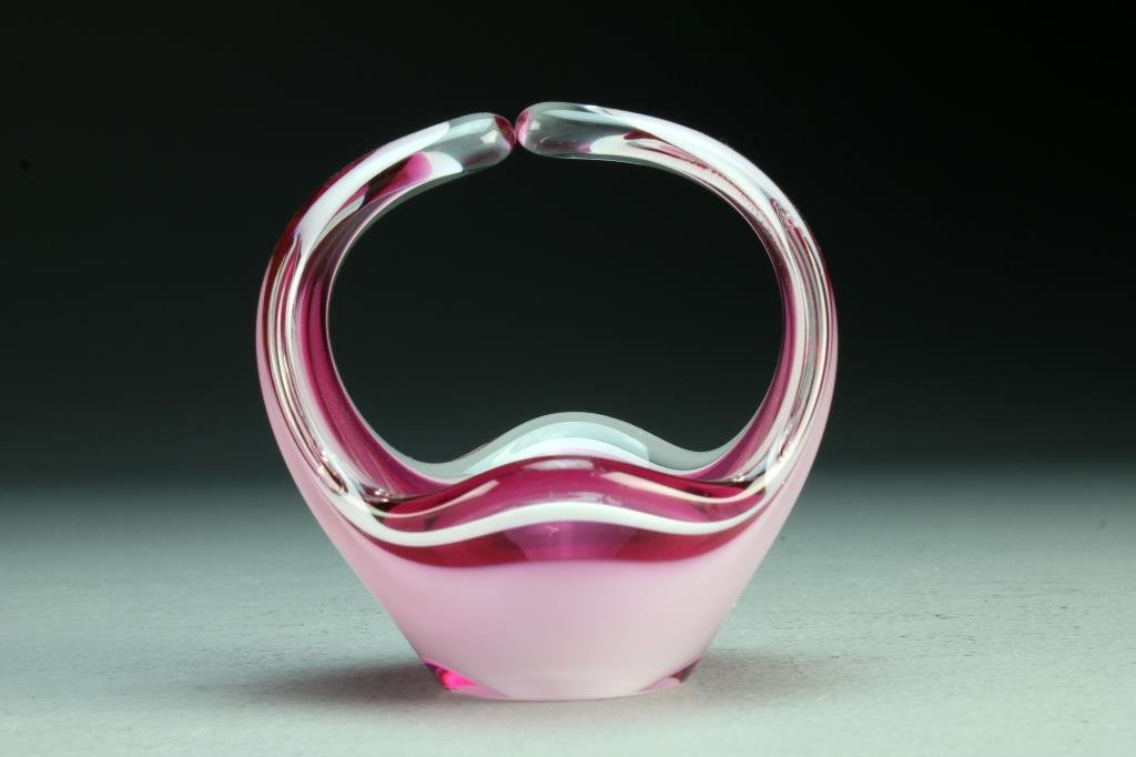 A Mid Century Flygsfor Coquille Art Glass Basket: Of small scale, having conjoined handled and multi colored glass, signed and dated to foot rim "57".