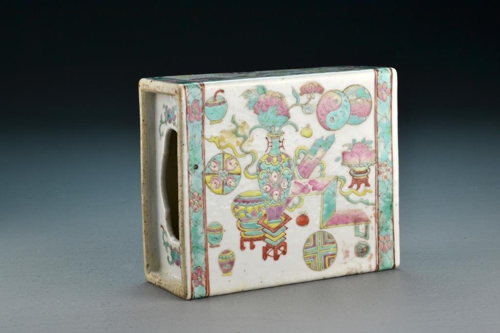 Chinese Qing Famille Rose Porcelain Pillow: Painted to depict precious objects, 5.5" H, circa late 19th-early 20th Century. Collection of the Late Robert Willis owner of R.F. Willis Galleries, Grand Rapids, Michigan.