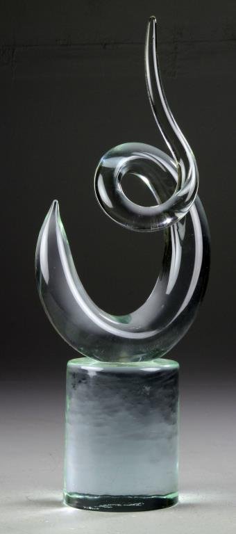 A Signed Art Glass Sculpture: Of free form shape, having a cylindrical base in clear glass, with etched signature to the underside, undetermined by us, 16.25"H, circa 20th century. Collection of the Late Robert Willis owner of R.F