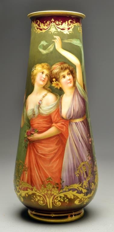 Exceptional Royal Vienna Signed Wagner Portrait Vase: Hand painted porcelain to depict two beauties in a landscape, with gilt floral spray decoration against a deep red lustre ground, signed Wagner to lower left, the underside of base marked with a red b
