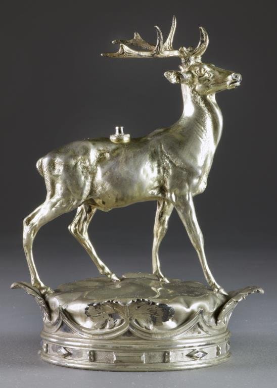 Elkington & Co. Sterling Stag Centerpiece: Depicting a stag standing atop a crown, with hallmarks and maker's mark for Elkington & Company, measures 10"H, total weight 1,135 grams or approximately 36t oz., circa turn of the century. Condition: