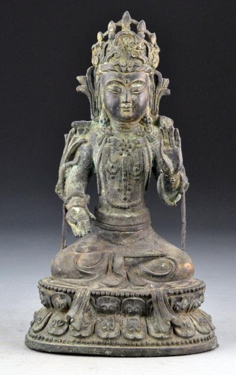 Chinese Ming Bronze Guanyin: Sitting on a lotus base, hands in Buddhist Mudra, 12.75"H, 17th century. Property of a Houston Texas Gentleman.