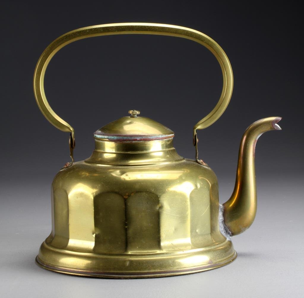 An American or Continental Brass Teapot: Having a gooseneck spout and paneled body and large arched handle, 12"H, circa late 19th century.