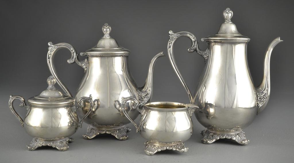 (4) Pcs. WM Rogers & Son Coffee and Tea Service: To inlcude two "Victorian Rose" kettles, a creamer, and lidded sugar bowl, all having scroll and floral decorated and raised on floral decorated splayed scroll feet, all marked for "WM Rogers & Son", 