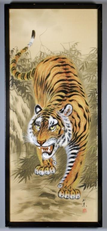 Signed Japanese Watercolor Painting on Silk: Painted to depict a crouching tiger, signed lower right with character marks and red seal mark, 41"H x 18"W framed, circa 20th century. Condition, painting very good overall, frame with very light wea