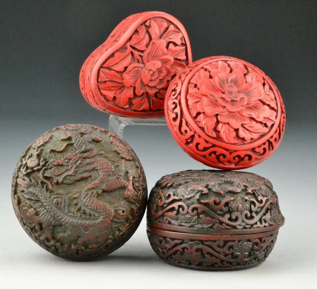 (4) Pcs. Chinese Carved Wood and Lacquer Boxes: To include two cinnabar carved boxes (one heart, one round) with floral and scroll decoration along with two carved wooden circular boxes with dragon decoration and bearing impressed 4-character mark 