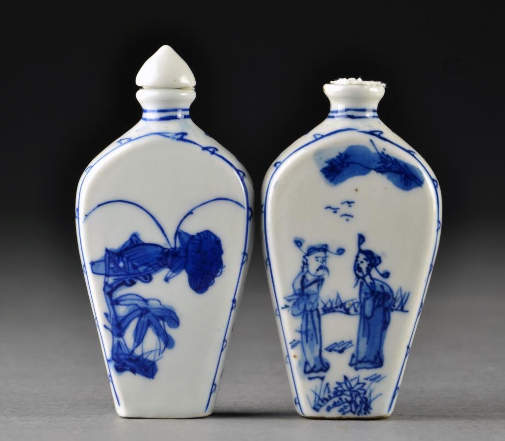 (2) Chinese Blue and White Porcelain Snuff Bottles: Finely painted at center to depict bunches of grapes, a cricket and figures in a landscape, each having border design and bases marked by a leaf in underglaze blue, tallest is 3.4"H.