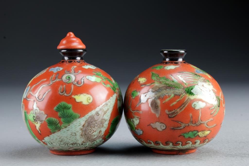(2) Chinese Painted Porcelain Snuff Bottles: Finely painted to depict five clawed dragons, phoenix, koi fish, flaming pearl and ruyi clouds, bases bearing four character mark in underglaze blue, tallest is 2.9"H.