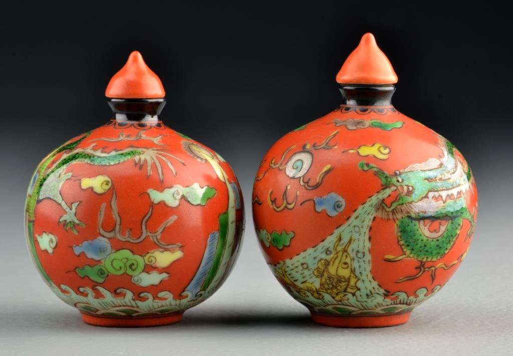 (2) Chinese Painted Porcelain Snuff Bottles: Finely painted with similar depiction of five clawed dragon with koi fish, flaming pearl and ruyi clouds, bases bearing four character mark in underglaze blue, tallest is 3.2"H.