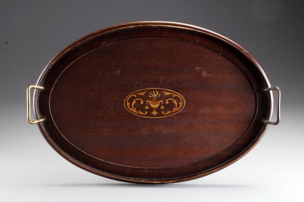 A Sheraton Mahogany Inlaid Serving Tray: English circa 1880-1900, having stepped sides, satinwood inlay depicting urn and medallion motif and having two brass bail handles ,19"w. Condition, age split to one side of tray