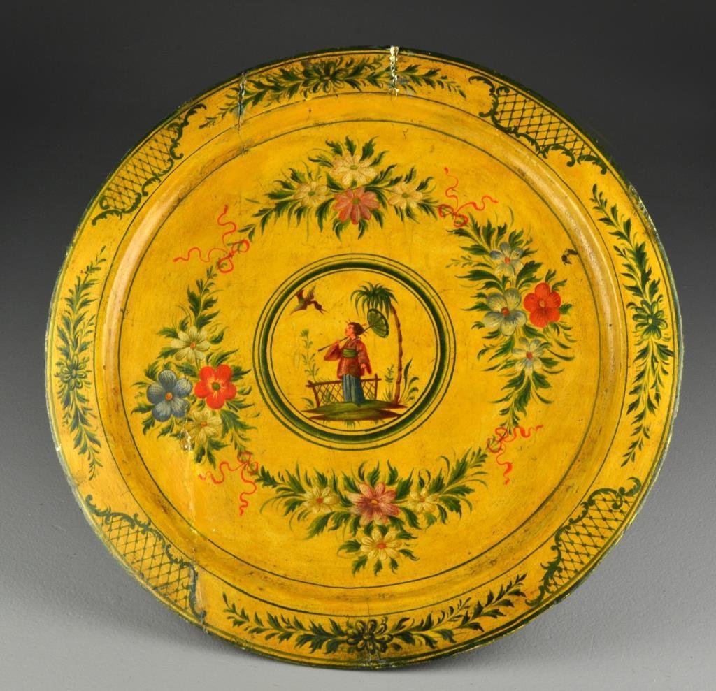 Antique English Polychrome Painted Lacquer Tray: Decorated in the Asian motif with floral and swag border and central figure of a boy with umbrella, 16"D, circa late 19th-early 20th century, with two old paper labels to underside. Condition, with se