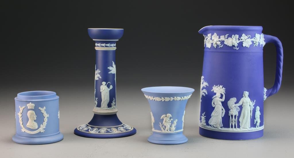 (4) Pcs Wedgwood Jasperware: To include a pouring pitcher, candlestick, a small open vase and a jar, probably lacking cover, largest measures 8"H, circa early-mid 20th century. Property of a Birmingham Michigan Family.