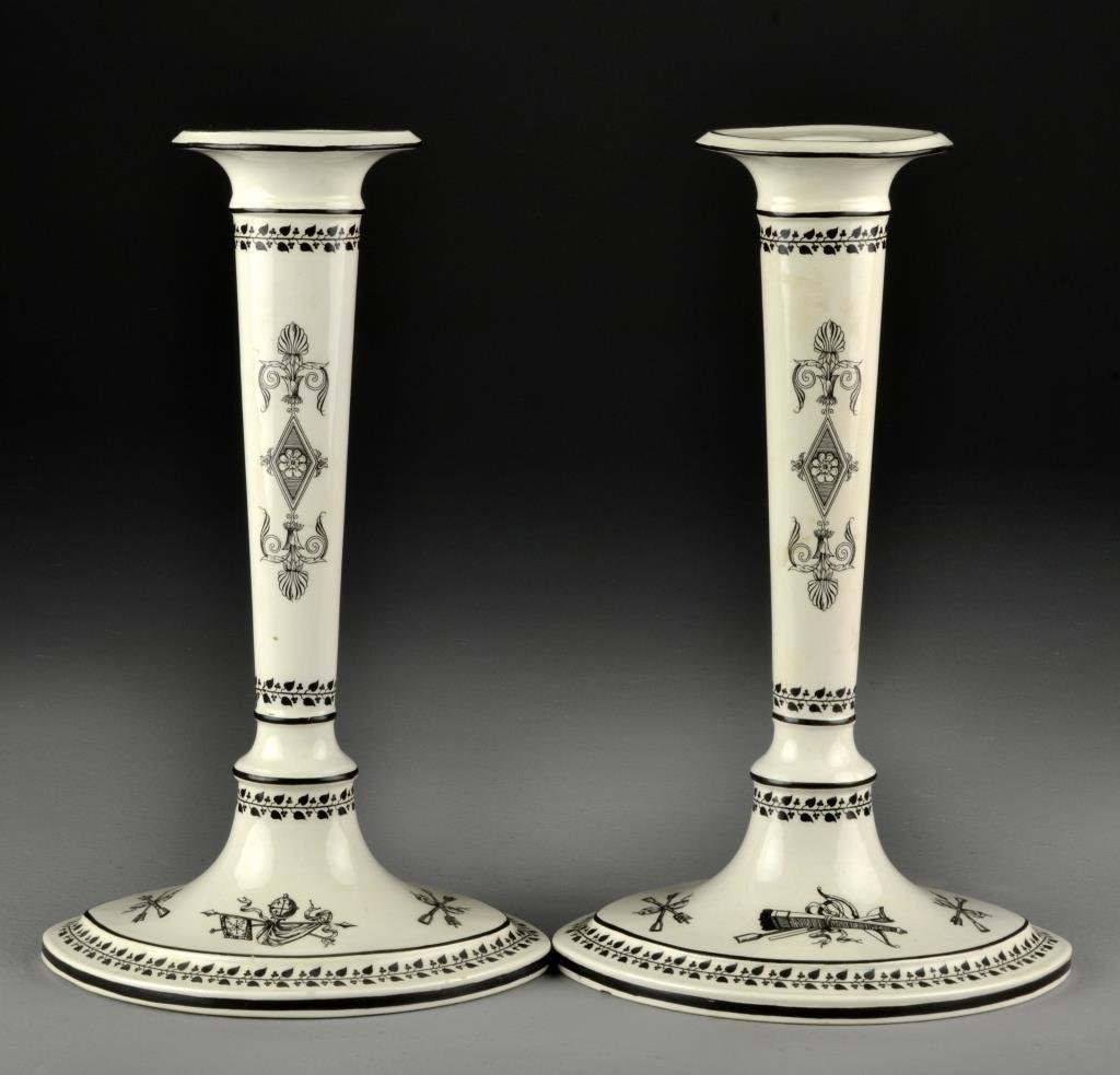 Pr. Mottahedeh Italian Porcelain Candlesticks: Each of tapered form and transfer decorated with vine banding, arrows and compasses, signed to base "S 5074 Italy", measures 10"H, circa 20th century.