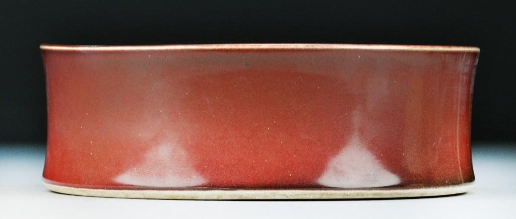Chinese Ox Blood Porcelain Brushwash: Large brushwash with ox blood glaze, bearing Daoguang seal mark in underglaze blue, 3"H X 9"D. Private collection Rochester Hills Michigan.