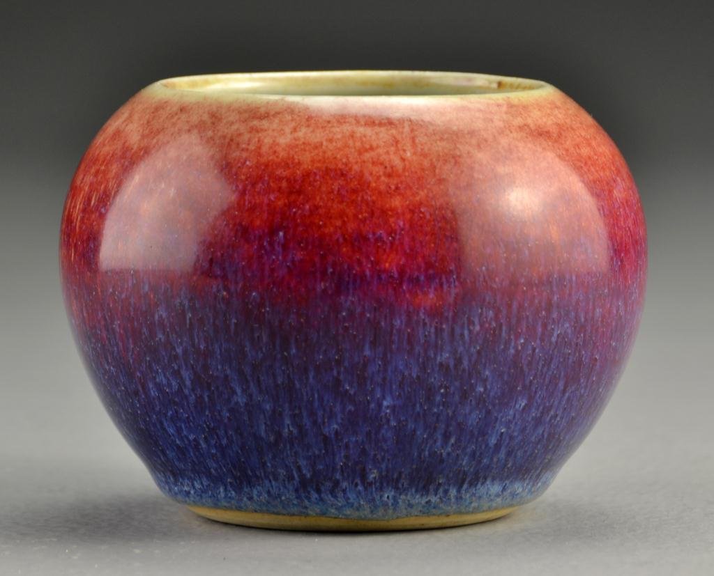 Chinese Sang de Boeuf Porcelain Waterpot: Having a deep purple glaze graduating to ox blood red, base with six character Guangxu mark in underglaze blue, 3"H X 4"D.