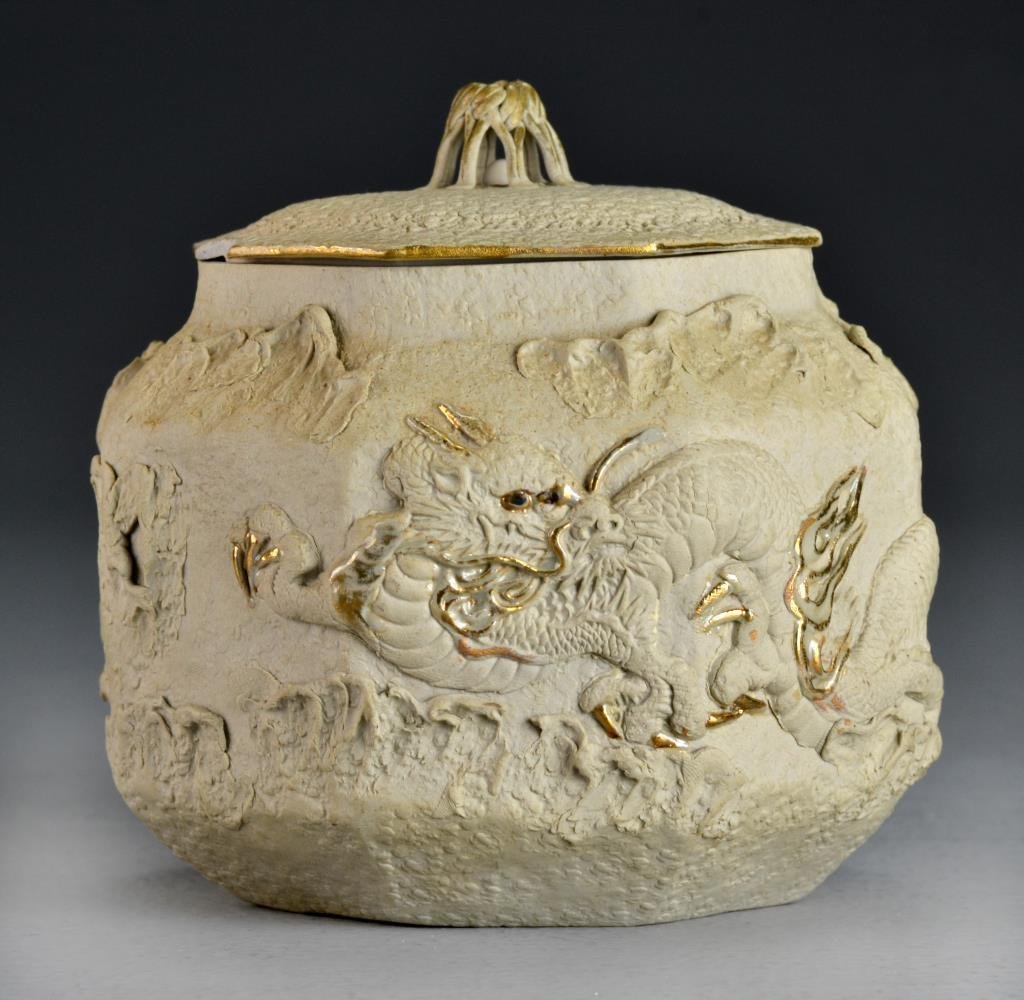 Chinese Qing Molded Pottery Covered Vessel: Finely molded to depict a dragon and tiger to the body having gilt highlights, the lid with a uniquely formed finial having a loose bead at center, base with impressed seal mark, 4.75"H X 5"W, circa l