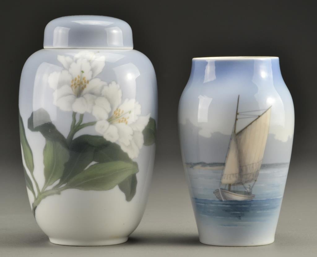 (2) Pcs. Royal Copenhagen Porcelain: To include a covered jar decorated with flowers and an open vase decorated with a sail boat, largest measures 7.5"H, circa 20th century.