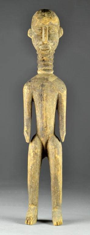 Antique African Carved Wood Statue of Figure: Carved to depict standing male figure with dzilla (neck rings), figure having well carved facial features, stands upright without support, measures 27.5"H, circa late 19th-early 20th century possibly 