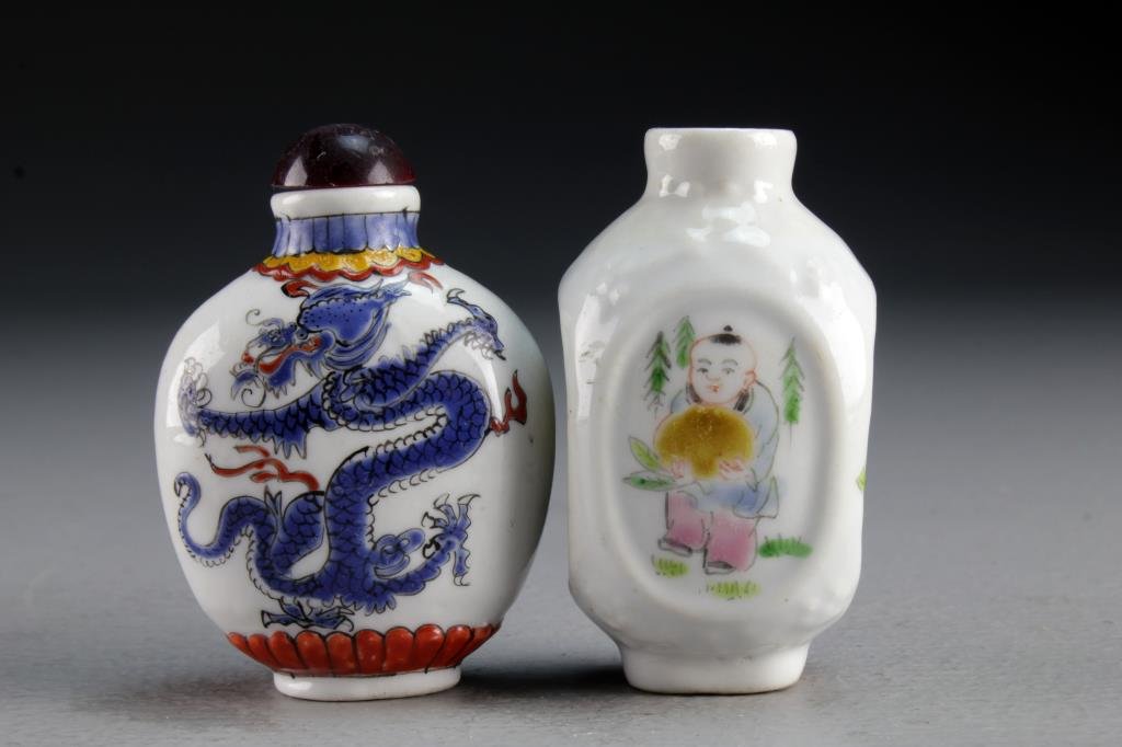 (2) Chinese Porcelain Snuff Bottles: One finely painted to depict five clawed dragon, the other having panels depicting playful youth, tallest is 2.5"H.