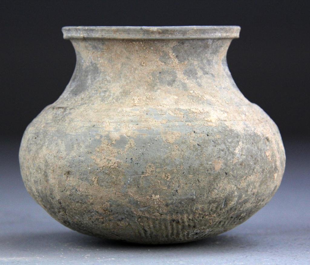 Chinese Han Dynasty Storage Jar: With rounded bulbous base, condition commensurate with age, 5."H X 6"D, circa Han Dynast 206 BC-220 AD.