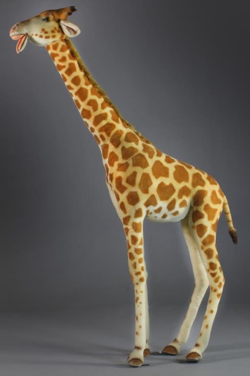 A Steiff Studio 8 Foot Giraffe: With tongue hanging out, circa 1960-1984 per photograph veiwing The Doll Factory, Royal Oak Michigan, measures 96"H.