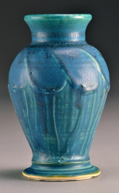 A Pewabic Pottery Vase Signed: Having molded designs in a thick blue glaze stamped with Pewabic mark and further initialed ??? 6.25"H, circa 20th century. Property of a Washington, MI family.