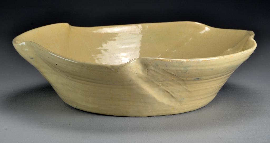 Early Pewabic Pottery Bowl: Free form centerpiece bowl in neutral tone, crazing throughout, with Pewabic stamps, tape inscribed "Made by William Buck Stratton, 1865-1938, Veteran of Spanish War", possibly a Mary Chase Perry Stra