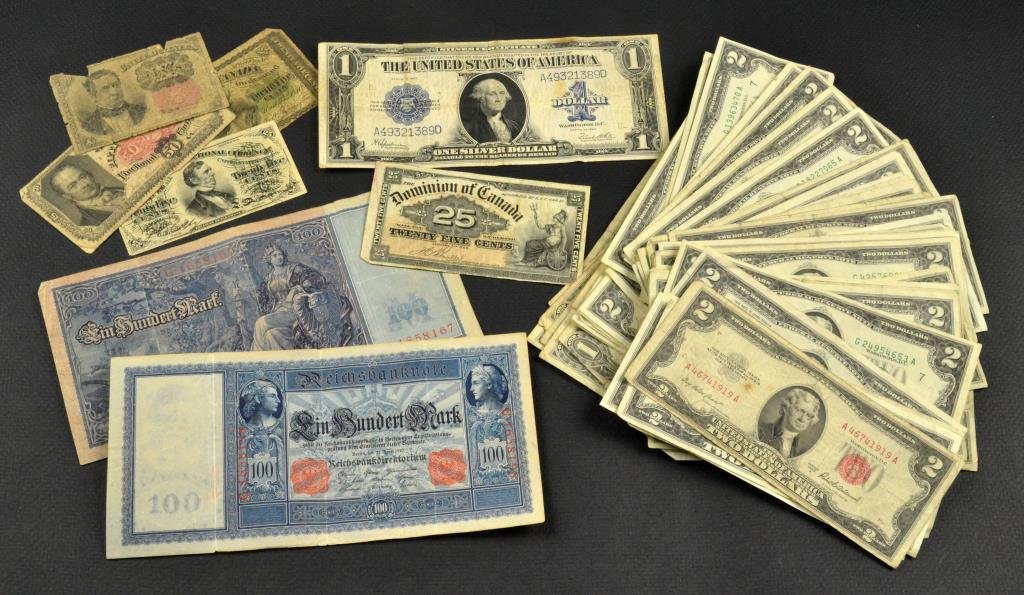 (69) Canada, German, & $ 62.00 U.S. Face Value: To include: 51 U.S. two dollar bills, series 1976, & one series 1953, ten U.S. silver certificate one dollar bills, a 1923 large one dollar bill silver certificate, 1863, .25 cent U.S. fractional Curr